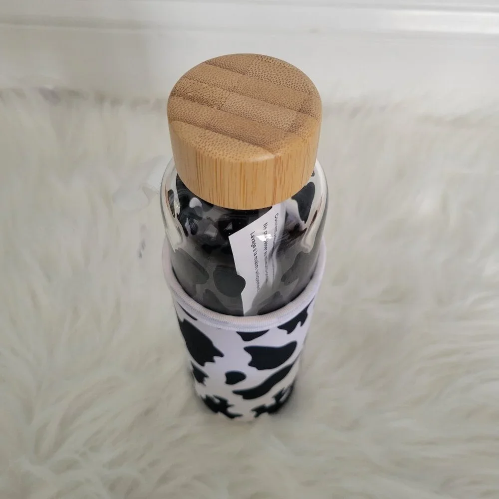 Claire's Cow Print Glass Water Bottle with Sleeve